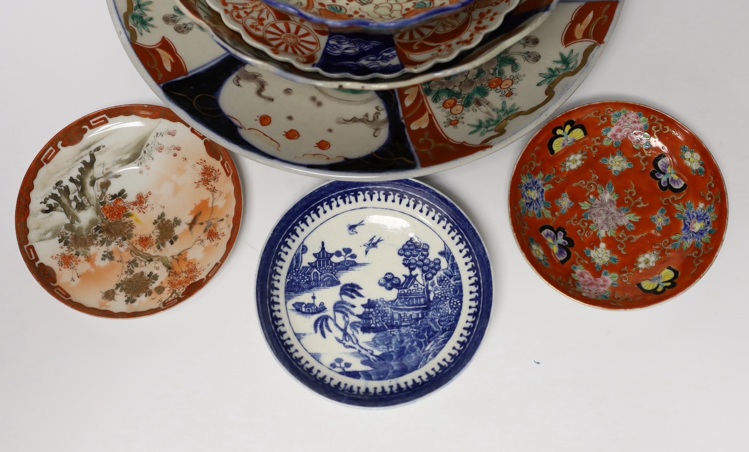 A group of Japanese Imari and kutani together with a Worcester blue and white saucer and a Chinese famille verte teabowl